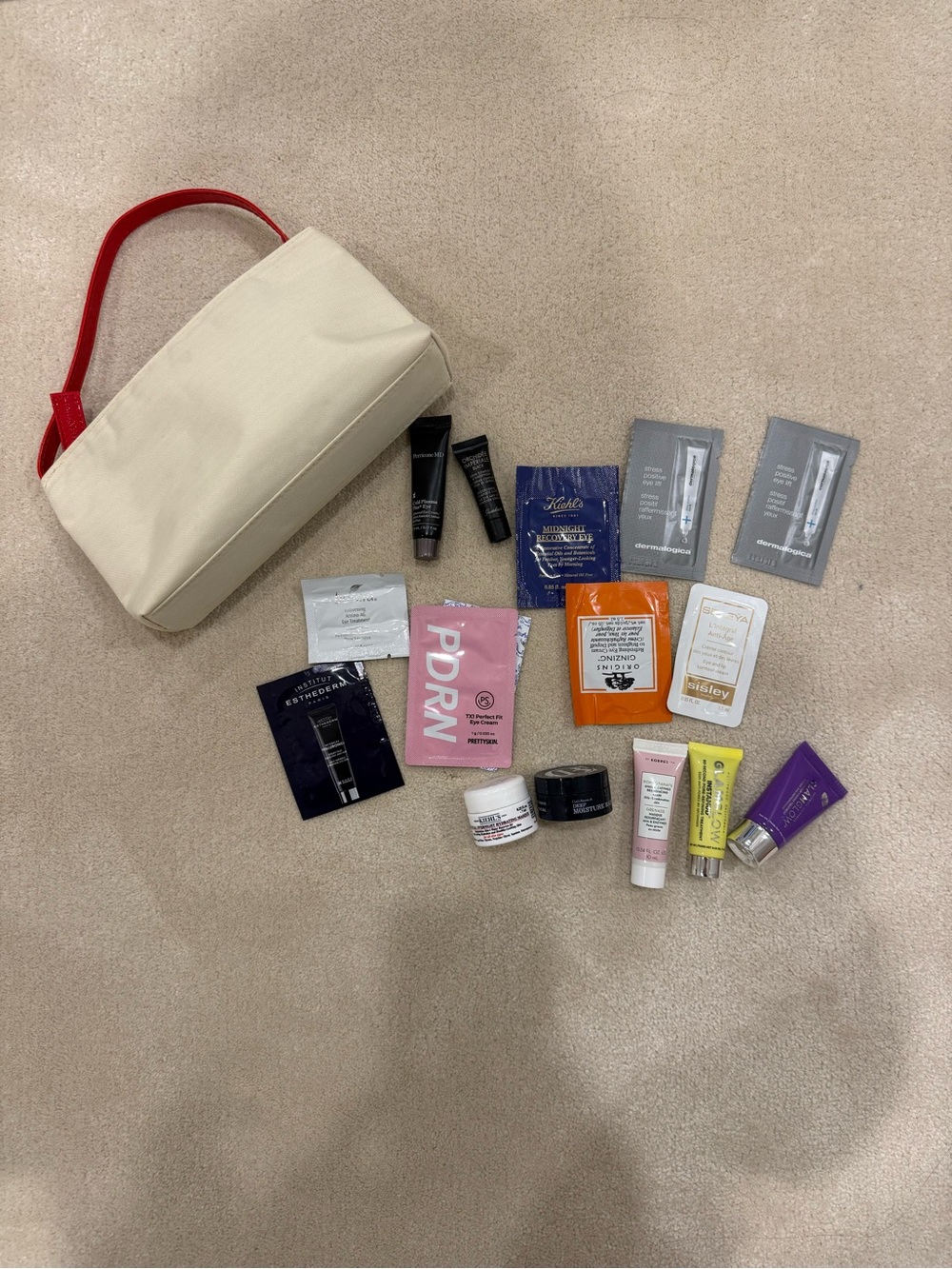 Make up pouch with skincare and perfume samples
